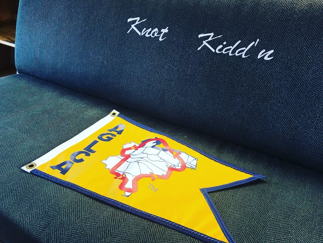 AGLCA burgee flag on boat seat
