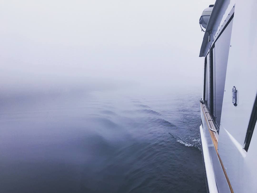 Boat in the morning mist