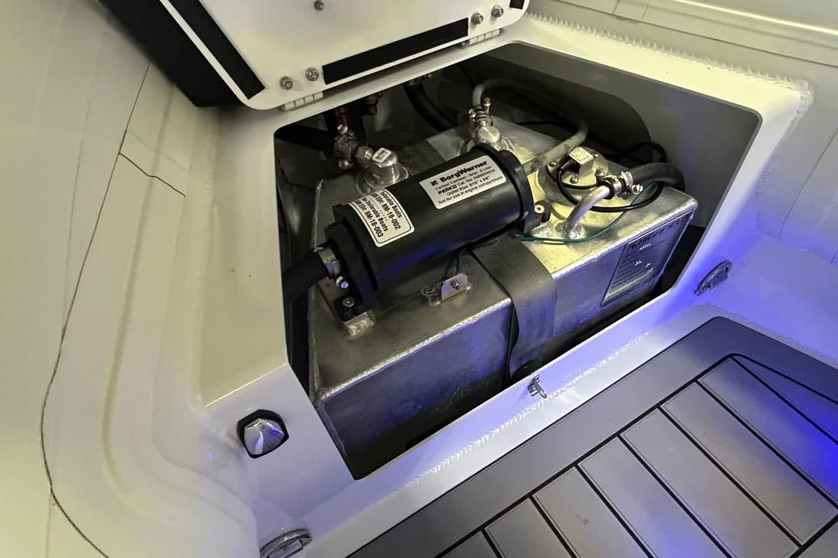 Engine compartment of 2025 Highfield Sport 390 boat, showcasing mechanical components.