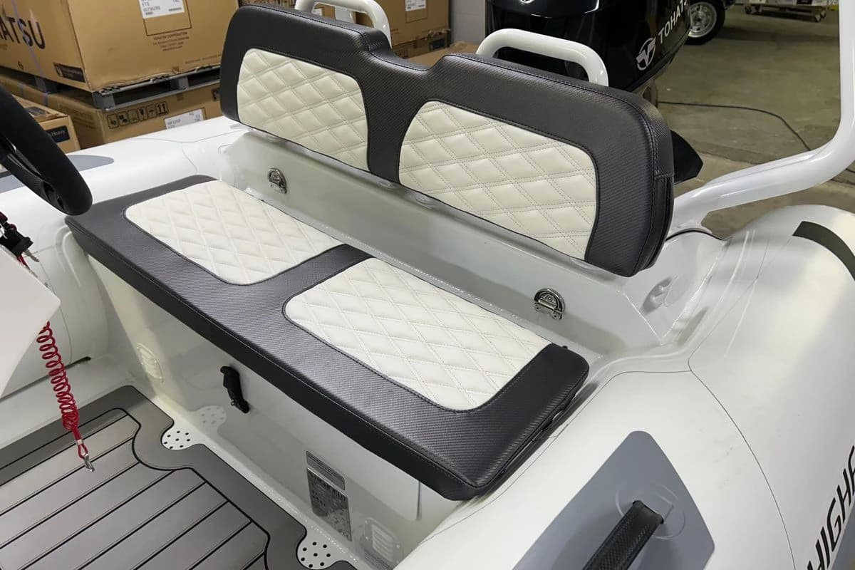 2025 Highfield Sport 390 boat interior with quilted seating and modern design.