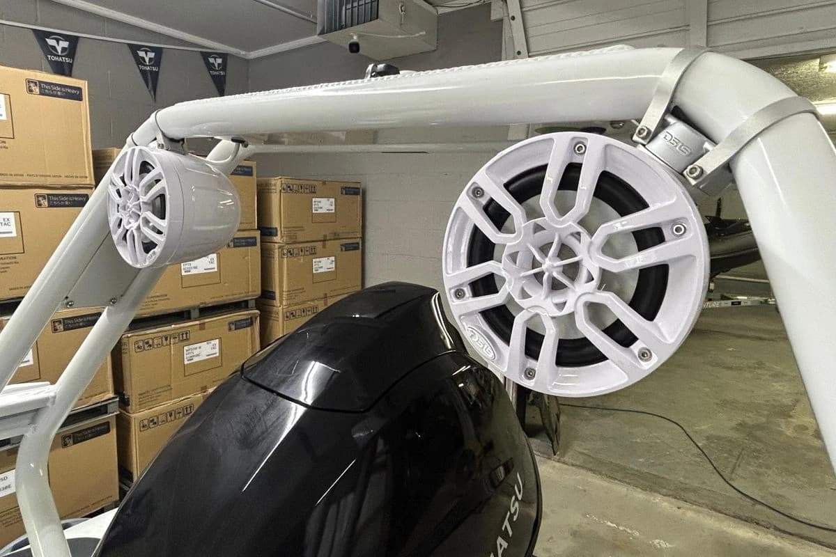 2025 Highfield Sport 390 boat speakers and engine in a storage area.